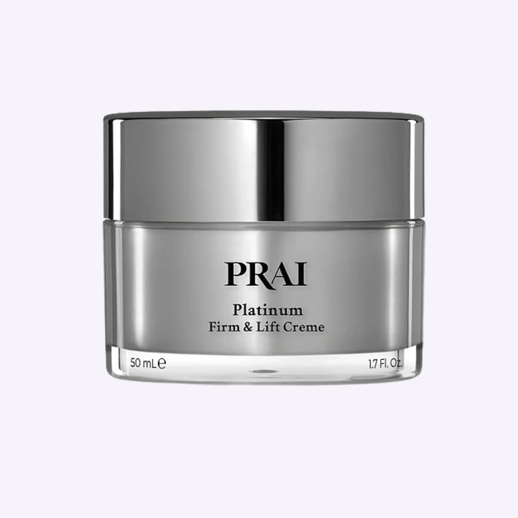 Jar of PRAI Beauty Platinum Firm & Lift Creme with silver and purple packaging