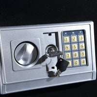 Electronic safe door open, revealing lock bolts and secure steel construction.