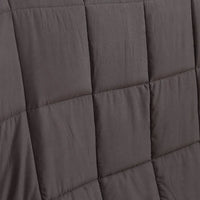 Weighted blanket folded with close-up on stitching and fabric quality details.