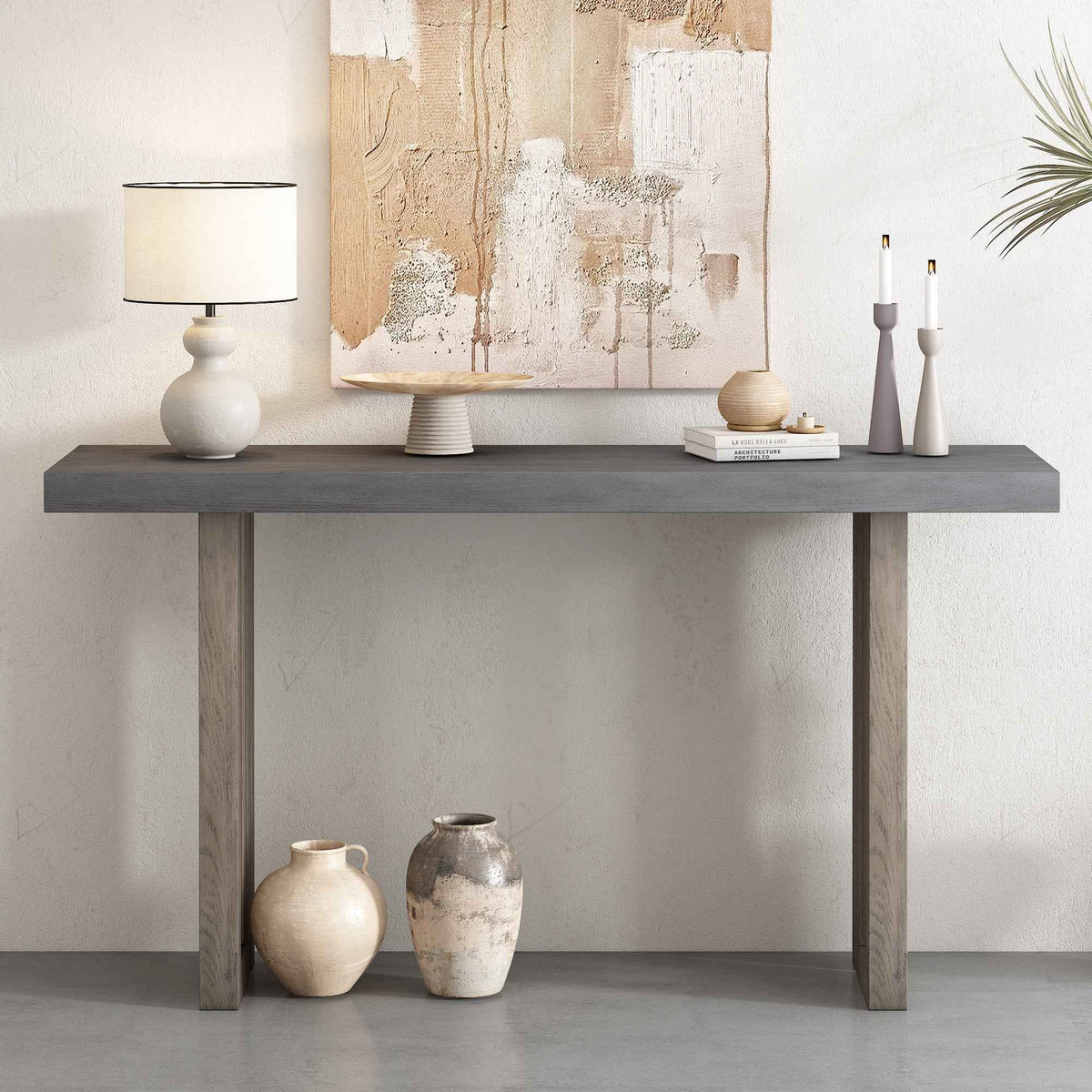 Gray oak veneer console table with intricate geometric side panel design in a modern living room.