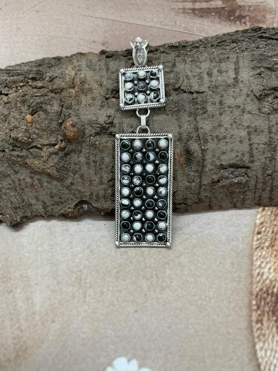 Handmade Sterling Silver White Buffalo Pendant with Signed Nizhoni