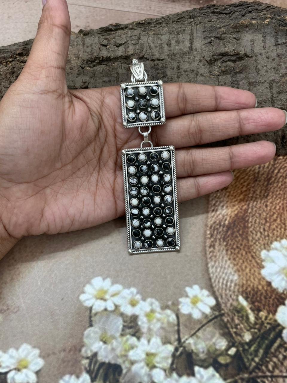 Handmade Sterling Silver White Buffalo Pendant with Signed Nizhoni