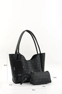 Black faux leather hand and shoulder bag with gold hardware and monogram pattern on front.