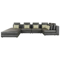 Large black modular sectional sofa with chaise lounge, featuring plush cushions and wide, spacious seating.
