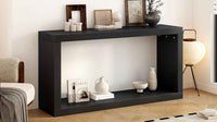 Close-up of black modern entrance table corner highlighting smooth geometric design
