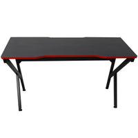 Close-up of gaming desk's carbon fiber textured surface and rounded edges.