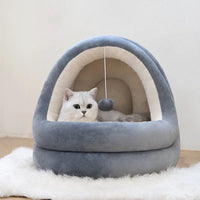 Cozy crystal velvet cat house bed with thick pillows for small pets, shown in a warm beige color.