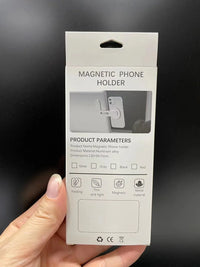 Laptop cell phone mount attached to notebook screen, showing easy magnetic suction feature.
