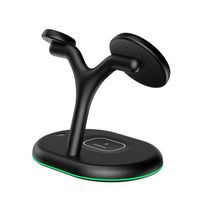 Close-up of the black wireless charger showing magnetic phone charging pad and USB charging port.