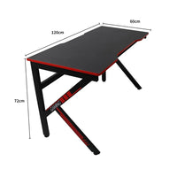 Side view of gaming desk showing K-shaped legs and sturdy construction.