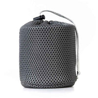 A lightweight 450ml titanium camping cup with folding handles, shown upright on a clean, white background.