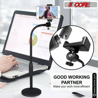 Black metal scissor arm phone stand with round base displayed on white background.