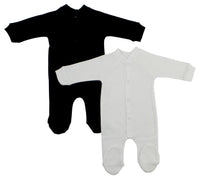Black and white closed-toe sleep and play long johns for babies, shown folded on white background.