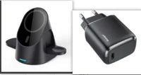 Black wireless charger folded and slightly opened, emphasizing sleek design.