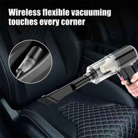 Compact, cordless handheld vacuum cleaner shown with attachments, designed for car and small space cleaning.