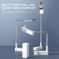 Folded portable selfie mobile phone holder with integrated ring light on white background.