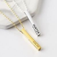 Close-up detail of sterling silver engraved personalized mother necklace with four customizable sides.