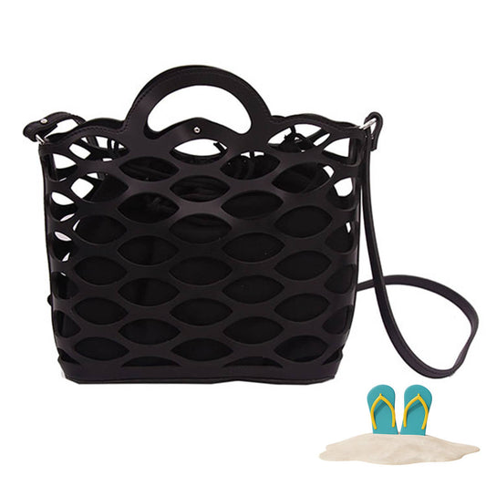 Medium beige beach tote bag with top handle and cut-out detail, button closure, and removable shoulder straps.