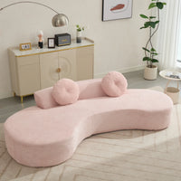 Large pink curved sofa with soft upholstered seats and a modern, minimalist design, comfortably seating three people.