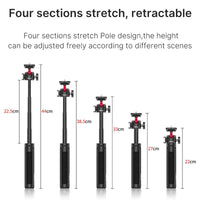 Tripod in compact form with folded legs resting on a flat surface.