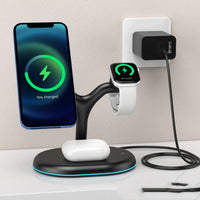 Black three-in-one wireless charger with magnetic phone, headset, and watch charging features on white background.