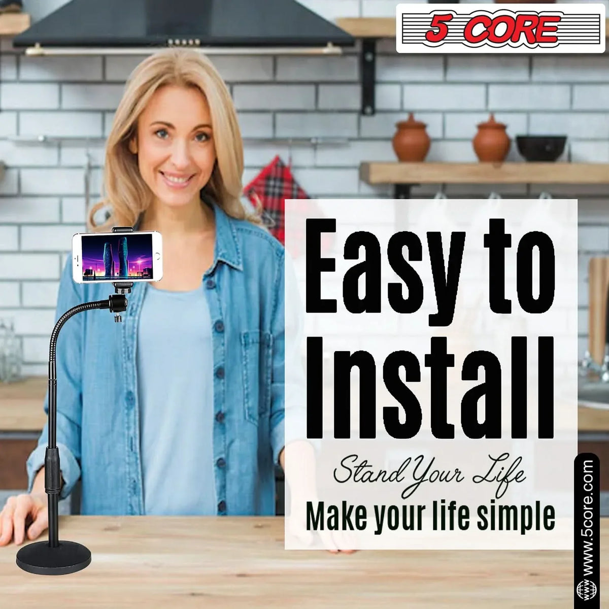 Fully extended adjustable scissor arm phone stand clamped on desk holding phone horizontally.