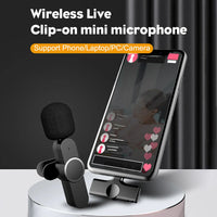 Wireless lavalier microphone with lapel clip and compact carrying case on a white background.
