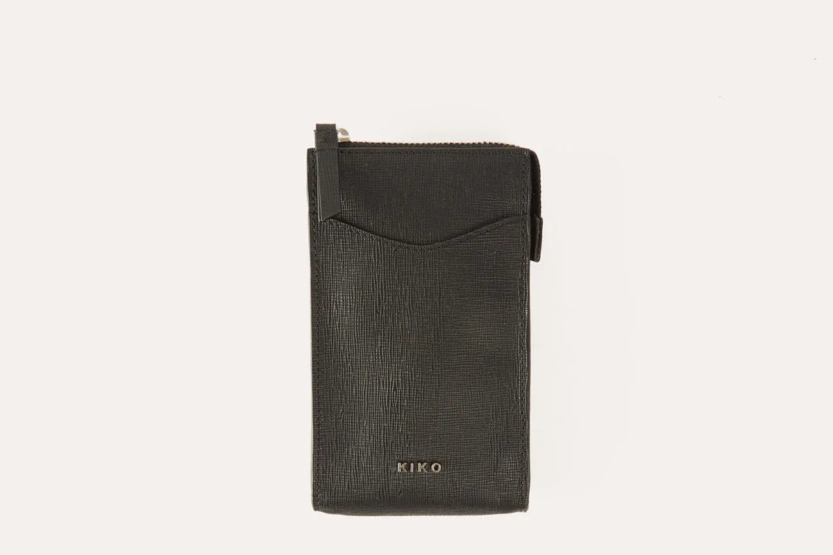 Genuine saffiano leather crossbody phone wallet with zip closure and slim profile in soft pink.
