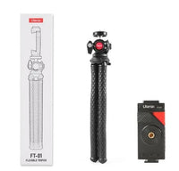 Phone clip attached to tripod, showcasing the adjustable components and sturdy build.