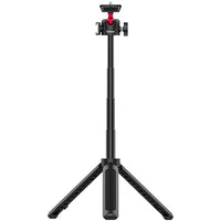 Close-up of tripod's locking mechanism and aluminum legs detail.