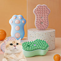 Electric pet grooming comb designed like a cat, shown on a white background.