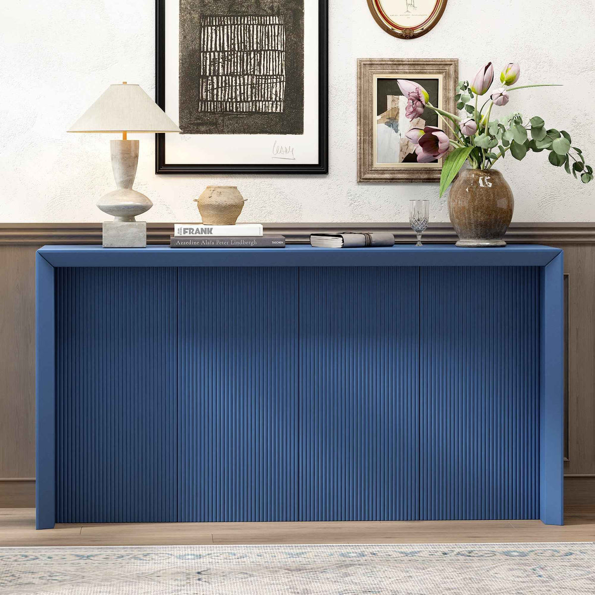 Navy blue acacia wood veneer entryway table with wavy design, angled side view on white background