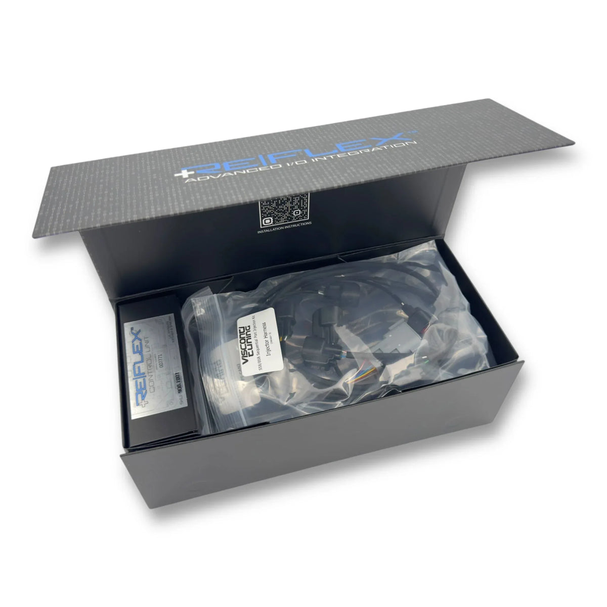ReFlex+ Advanced I/O Integration module with BMW B58/S58 plug-n-play kit components displayed on a white background.