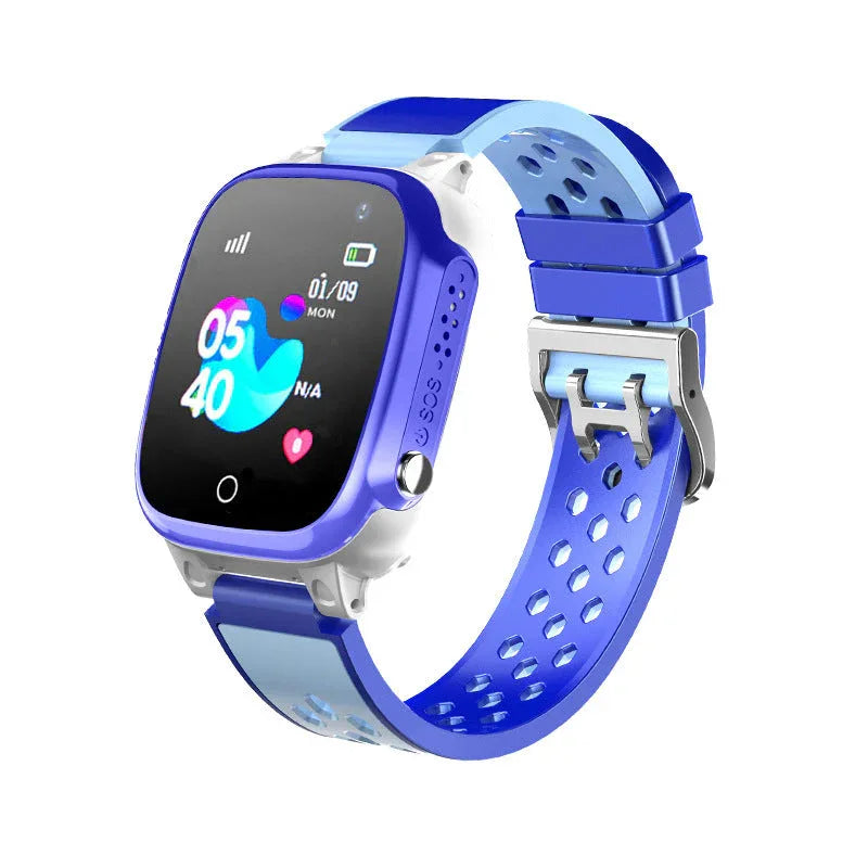 Kid's watch displayed with colorful plastic strap and screen showing icons and game apps.