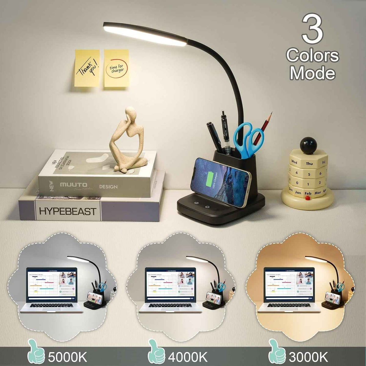 LED desk lamp illuminating an open notebook, phone charging on the base.