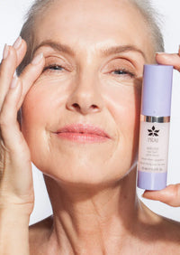 Close-up of smooth skin texture highlighting eye area, demonstrating serum lifting effect