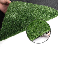 Side angle of synthetic turf illustrating thick, soft green blades resembling natural grass.