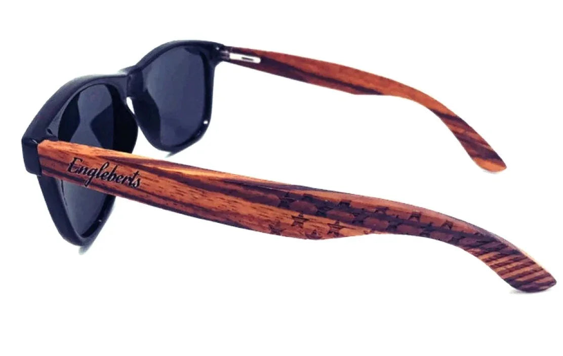 Side view close-up of premium Zebrawood polarized sunglasses with engraved artisan details