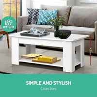 Close-up of white coffee table’s lift-up mechanism and metal hinges.