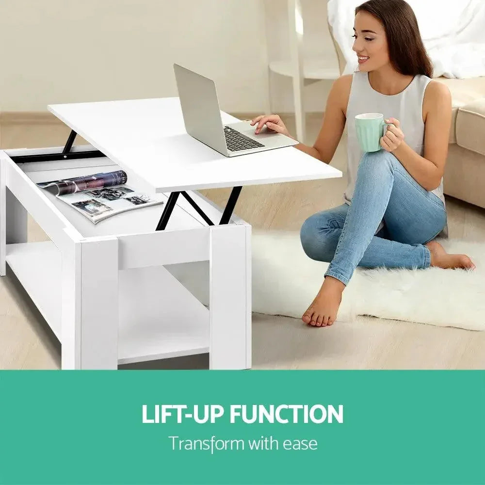 White coffee table with open top revealing spacious hidden compartment.