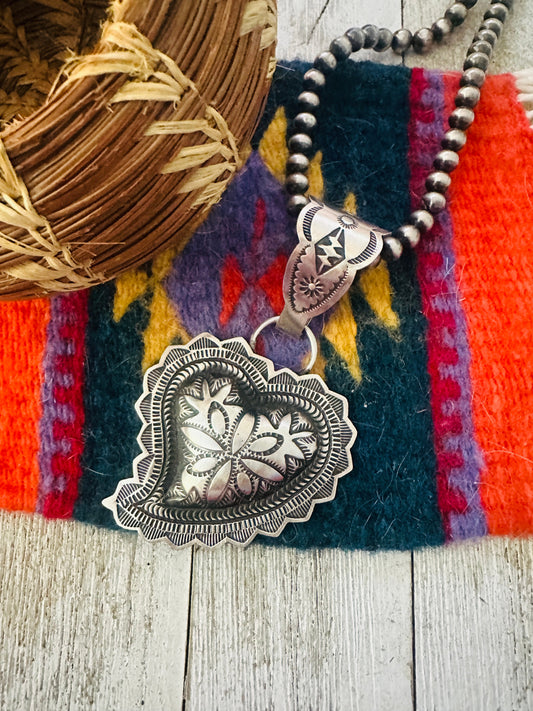 Handcrafted Sterling Silver Heart Concho Pendant by Leander Tahe