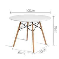 Close-up of white round tabletop showing smooth matt finish and wooden legs