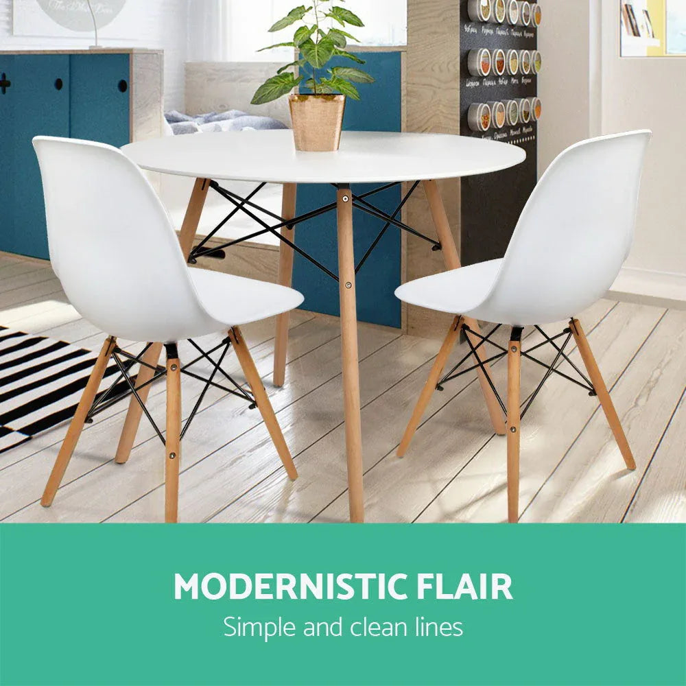 Dining table leg close-up showing solid beech wood and steel fixings