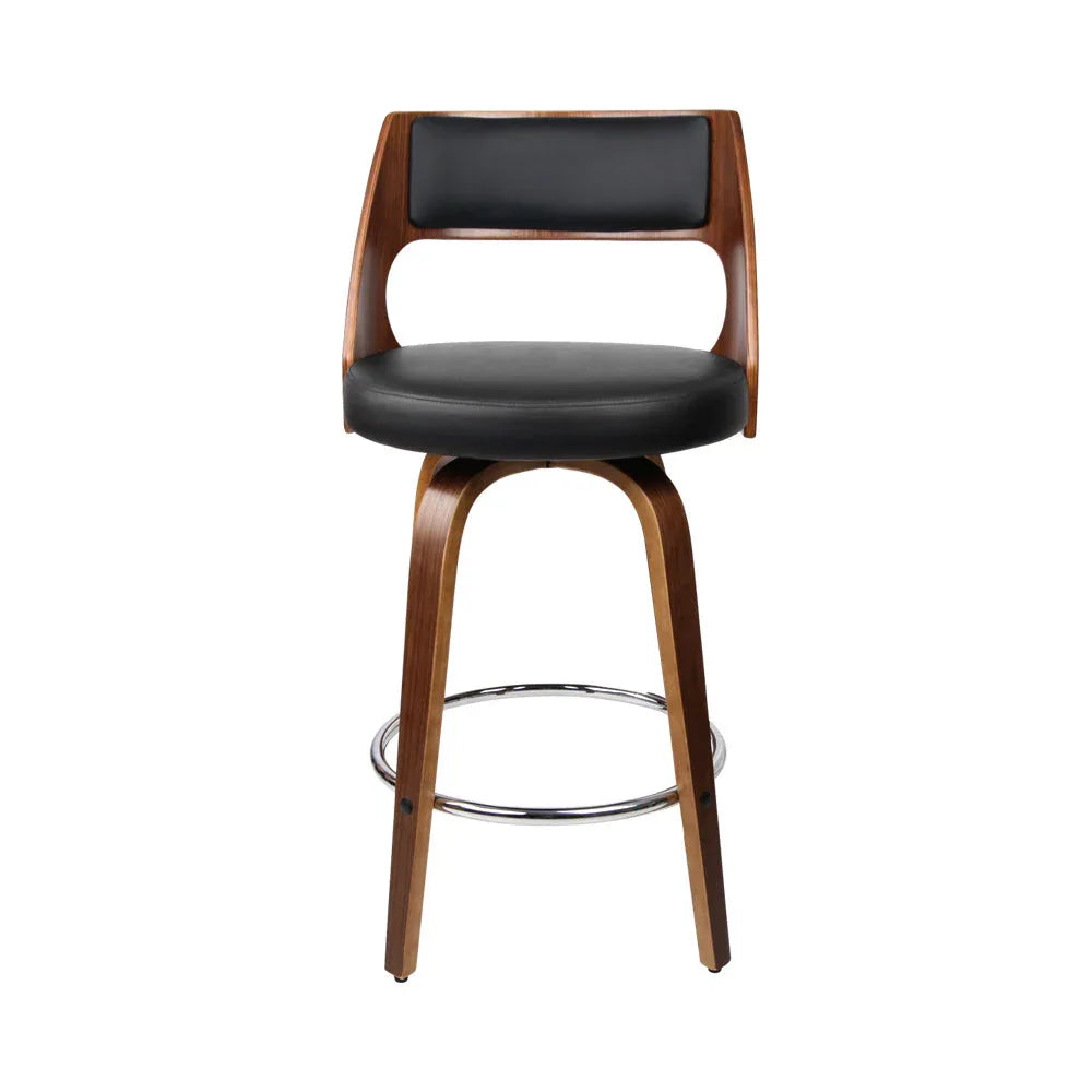 Close-up of the black PU leather padded seat and curved backrest on a wooden bar stool.
