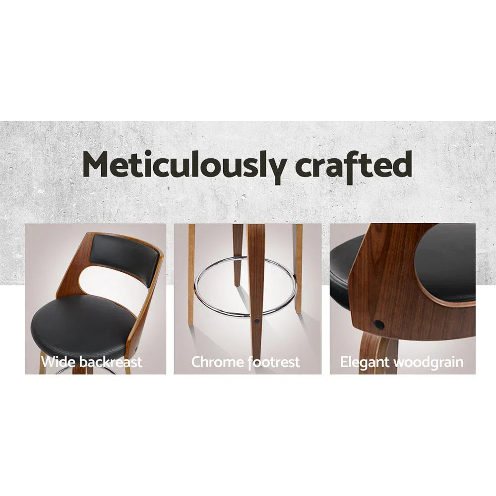 Wooden stool legs with walnut finish and anti-slip rubber feet supporting a bar stool.