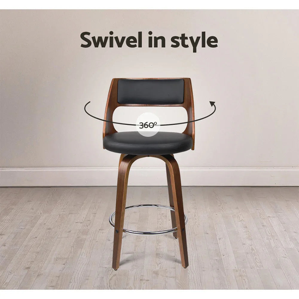 Back view of black bar stools highlighting the wide curved backrest and seat padding.