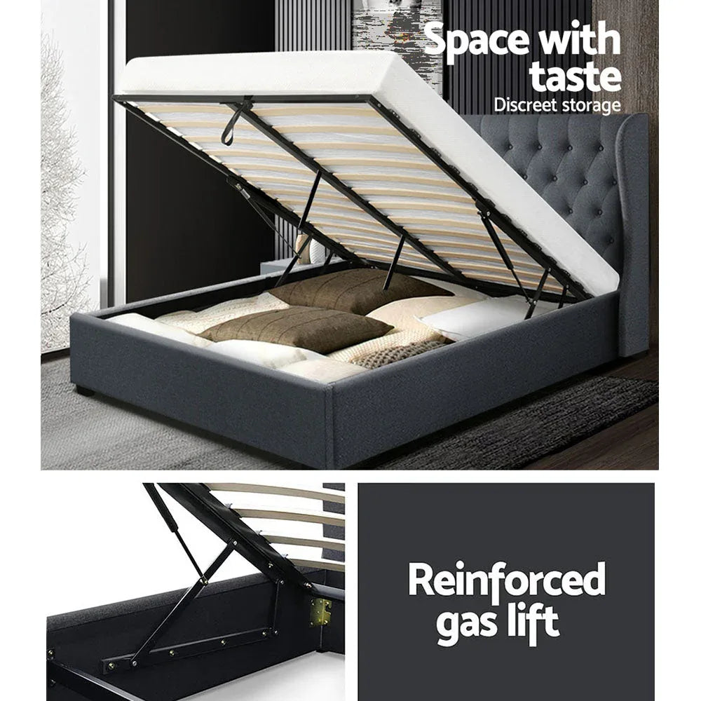 Wooden arched slat base supporting mattress on queen bed frame with gas lift mechanism.