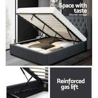 Wooden arched slat base supporting mattress on queen bed frame with gas lift mechanism.