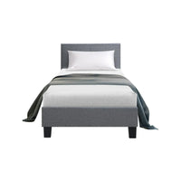 Close-up of smooth textured grey fabric upholstery on padded bedhead of King Single bed frame.