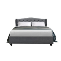 Close-up of tufted wingback pattern on grey upholstered Artiss Pier bed frame.
